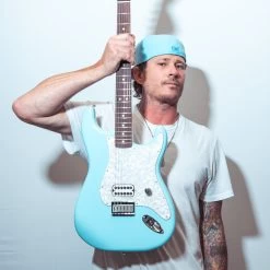 Fender Limited Edition Tom Delonge Stratocaster Electric Guitar In Daphne Blue -Professional Guitar Store 0148020304 Fender Limited Edition Tom Delonge Stratocaster Daphne Blue Lifestyle 2